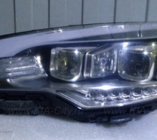 Фара левая Kia Quoris